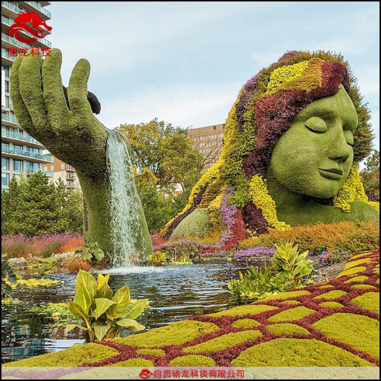 仿真人物造型绿雕制作草皮雕塑制作公园楼盘美陈景观绿植草雕塑厂家